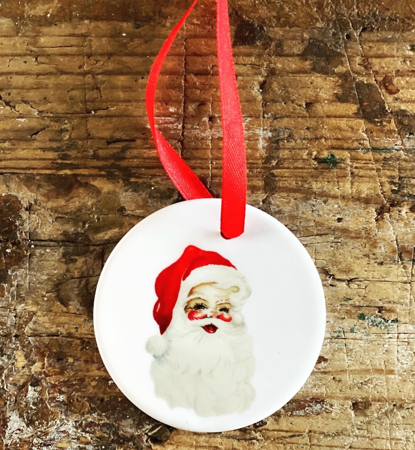 Ceramic flat bauble tree decoration with nostalgic Santa